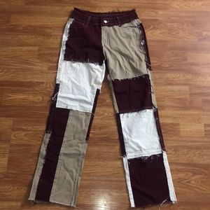 Woman’s distressed patched up pants.